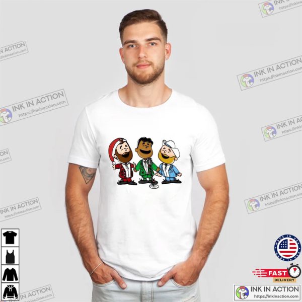 Jason Kelce Lane Johnson and Jordan Mailata Xmas Trio Cartoon Tee