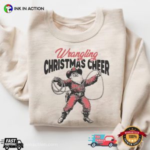 Wrangling Christmas Cheer cowboy santa Funny Shirt 1 InkInAction.com