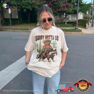 The Vibes Are Off Cowboy Frog Riding Raccoon T-shirt The Vibes Are Off Cowboy Frog Riding Raccoon T-shirt